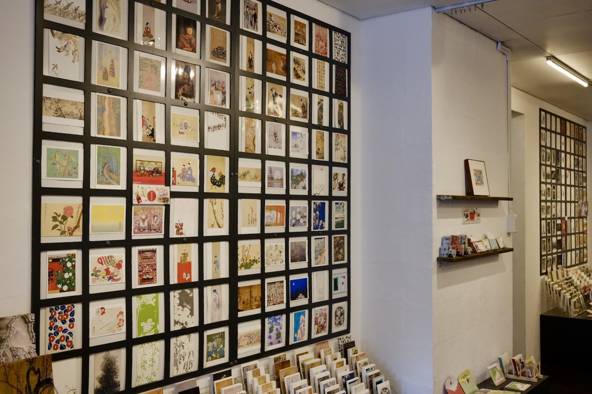 Wall of art postcards at the Kyoto Benrido Shop