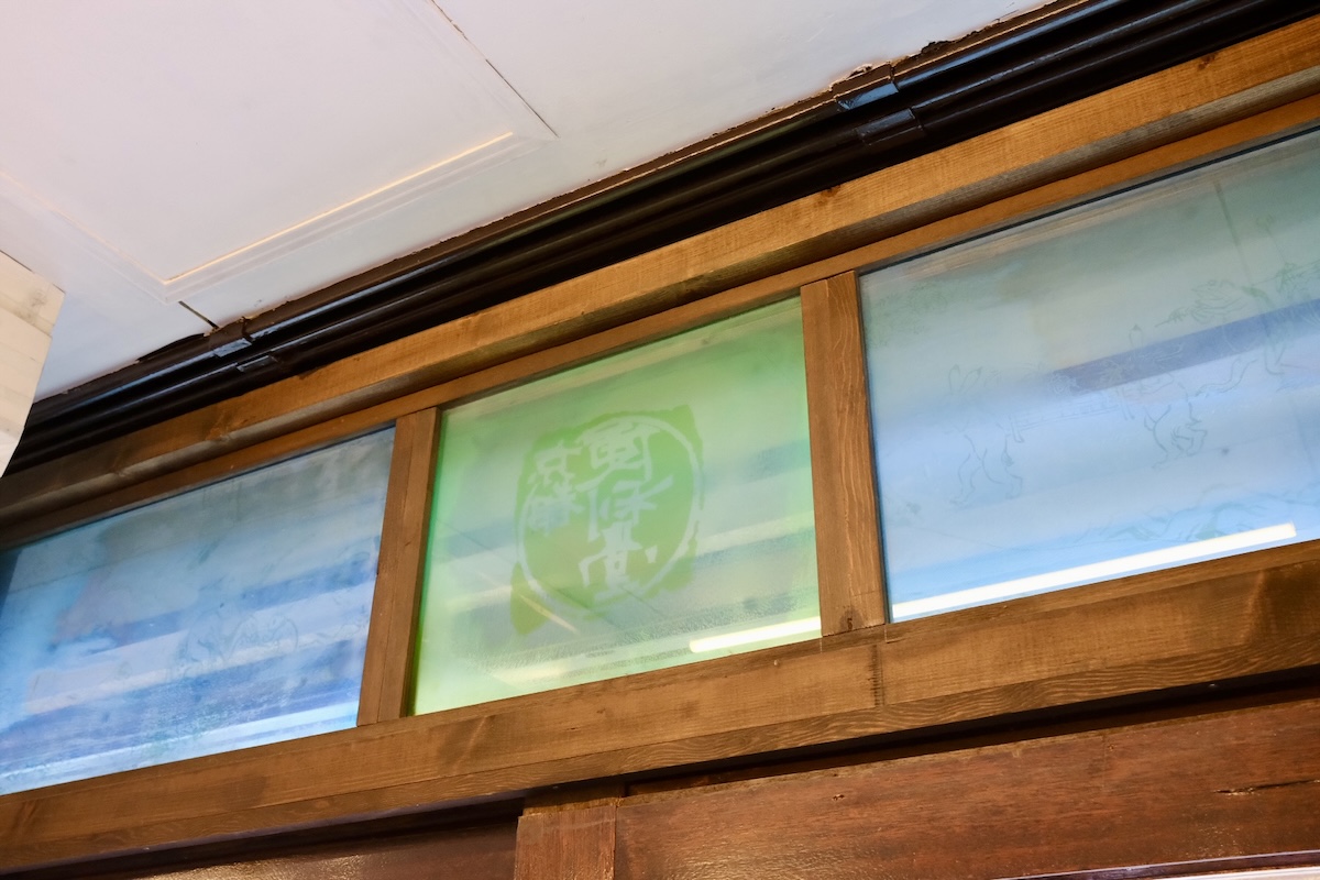 Glass printing plates from Kyoto Benrido’s collotype printing in the shop windows