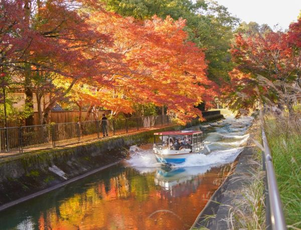 Boat cruising along the Lake Biwa Canal in Kyoto
